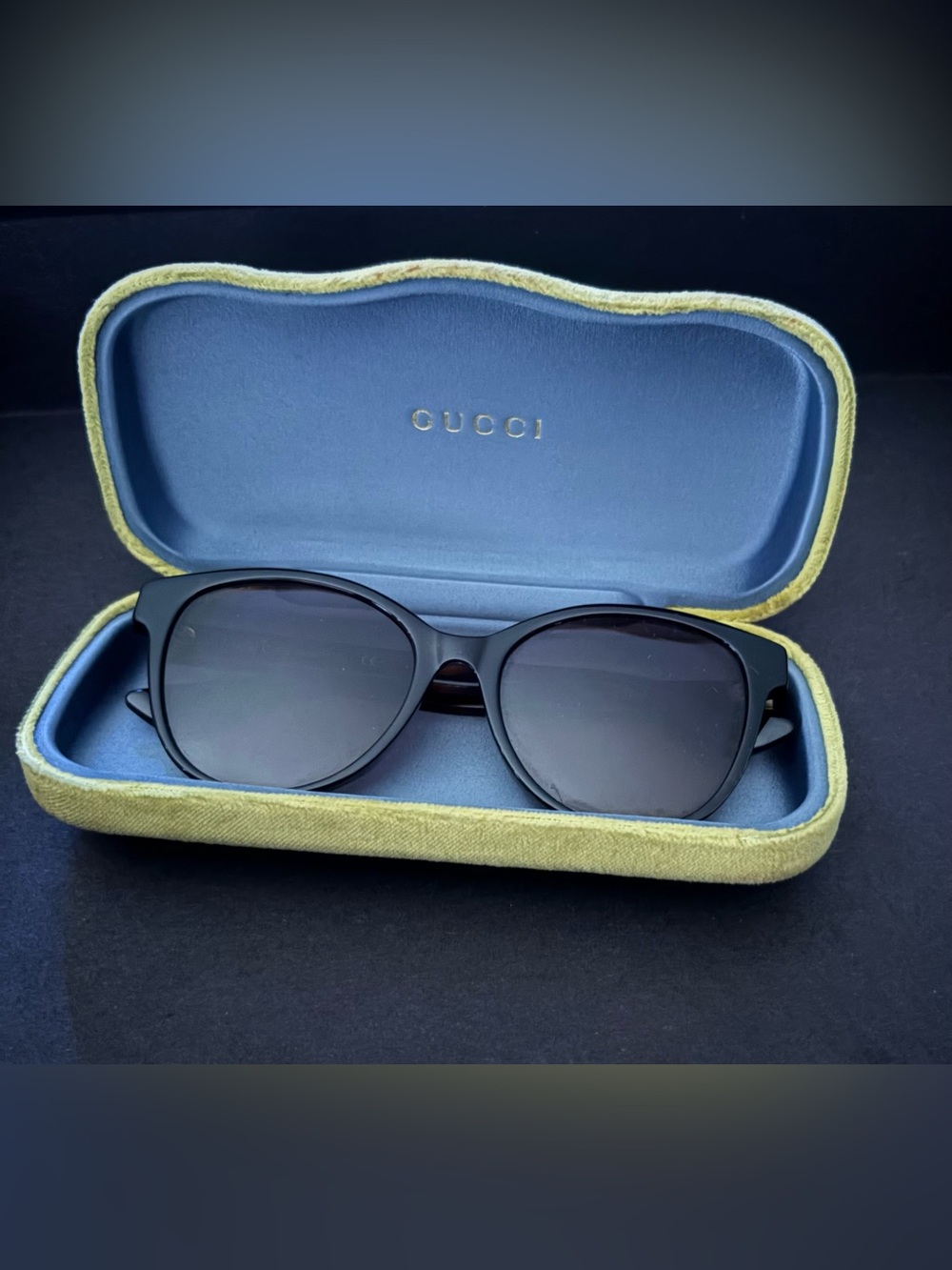 Gucci GGO7U3SK Black Sunglasses with Tortoiseshell Temples and Gold Logos